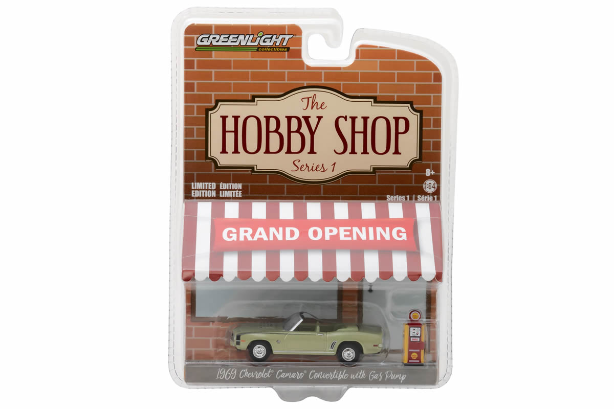 1969 Chevy Camaro Convertible with Vintage Gas Pump