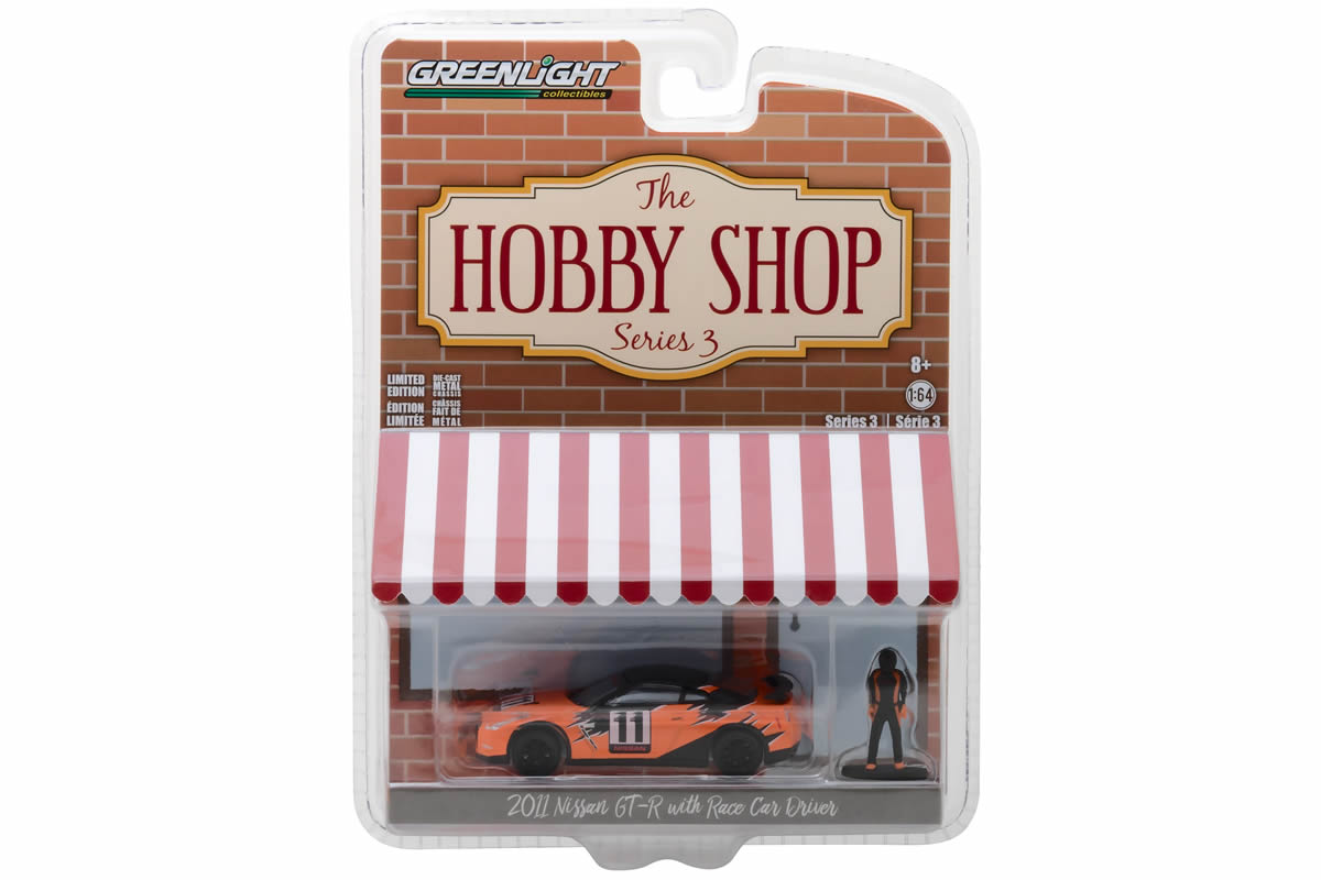 2011 Nissan GT-R (R35) with Race Car Driver