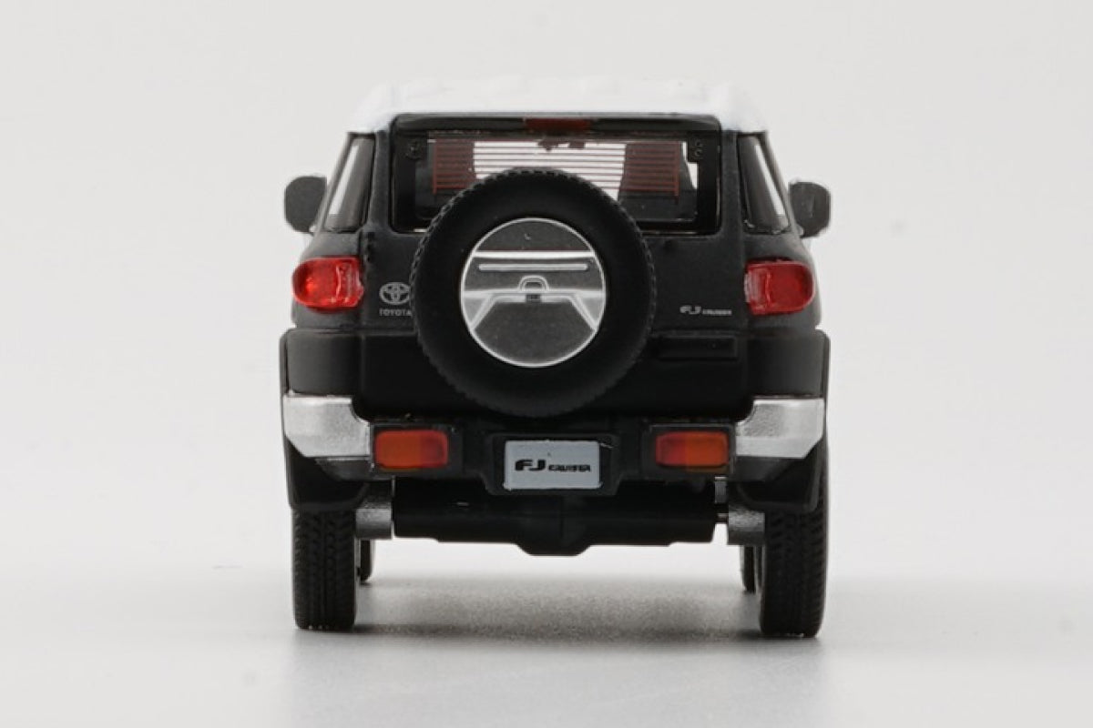 2015 Toyota FJ Cruiser with lots of accessories (Metallic dark grey with white roof)