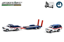 1992 Ford F-150 and 1992 Ford Bronco BFGoodrich Rough Riders on Flatbed Trailer