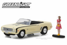 1969 Chevrolet Camaro Convertible with Woman in Dress