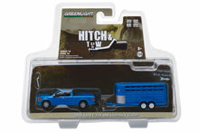 2016 Ford F-150 with Blue Livestock Trailer