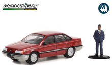 1989 Ford Taurus with Sales Associate in Suit