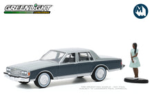 1981 Chevrolet Caprice Classic with Woman in Dress