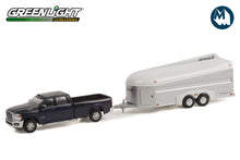 2021 Ram 3500 Laramie Crew Cab in Maximum Steel Metallic Clear with Aerovault MKII Trailer in White and Bare Aluminum
