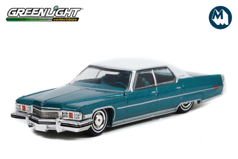 1973 Cadillac Sedan deVille (Teal with White Roof)