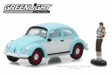 Classic Volkswagen Beetle with Backpacker